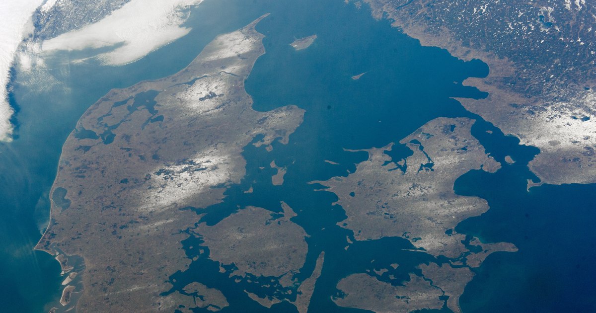 Jutland, Funen and Zealand photographed from the International Space Station, the cover image for the 2026 Danish defence industry report